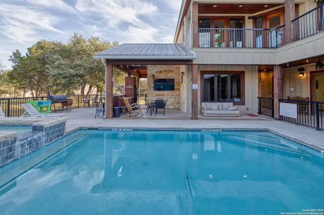 a view of house with outdoor seating