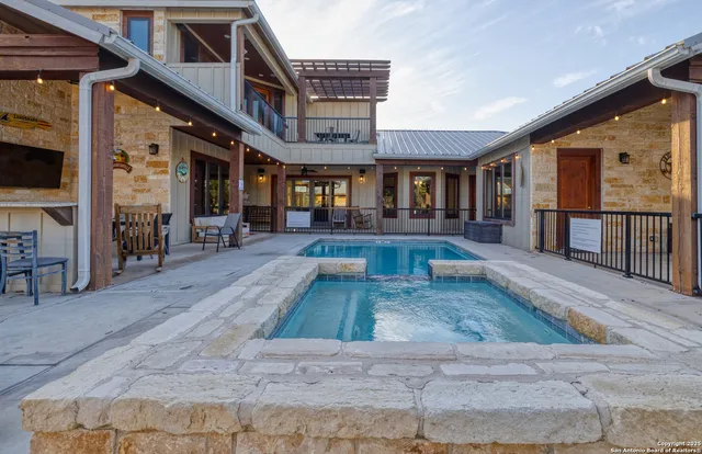 a view of a building with sitting area