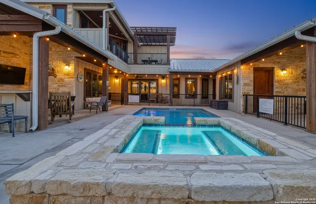 a room with lots of tables and large windows