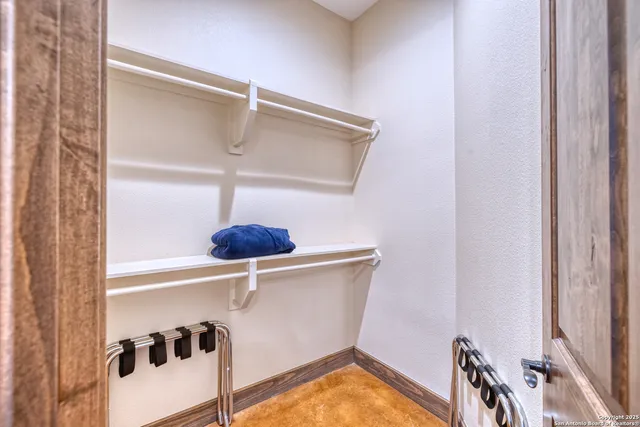 a view of a storage & utility room with washer and dryer