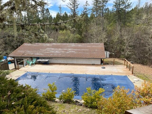 4196 East Evans Creek Road Rogue River, OR 97537 - Photo 7 of 36 a view of a wooden floor and a yard
