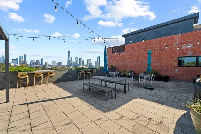 a outdoor space with lots of table and chairs