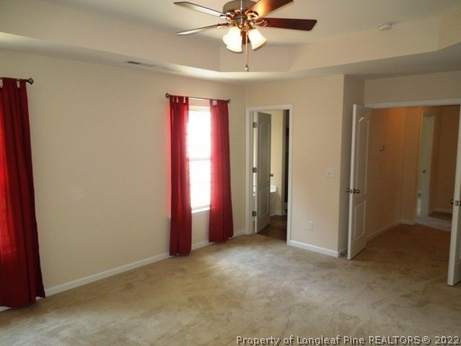 81 River Oak Street Spring Lake, NC 28390 - Photo 12 of 15 an empty room with windows and fan