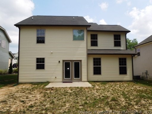 81 River Oak Street Spring Lake, NC 28390 - Photo 15 of 15 a front view of a house with a yard