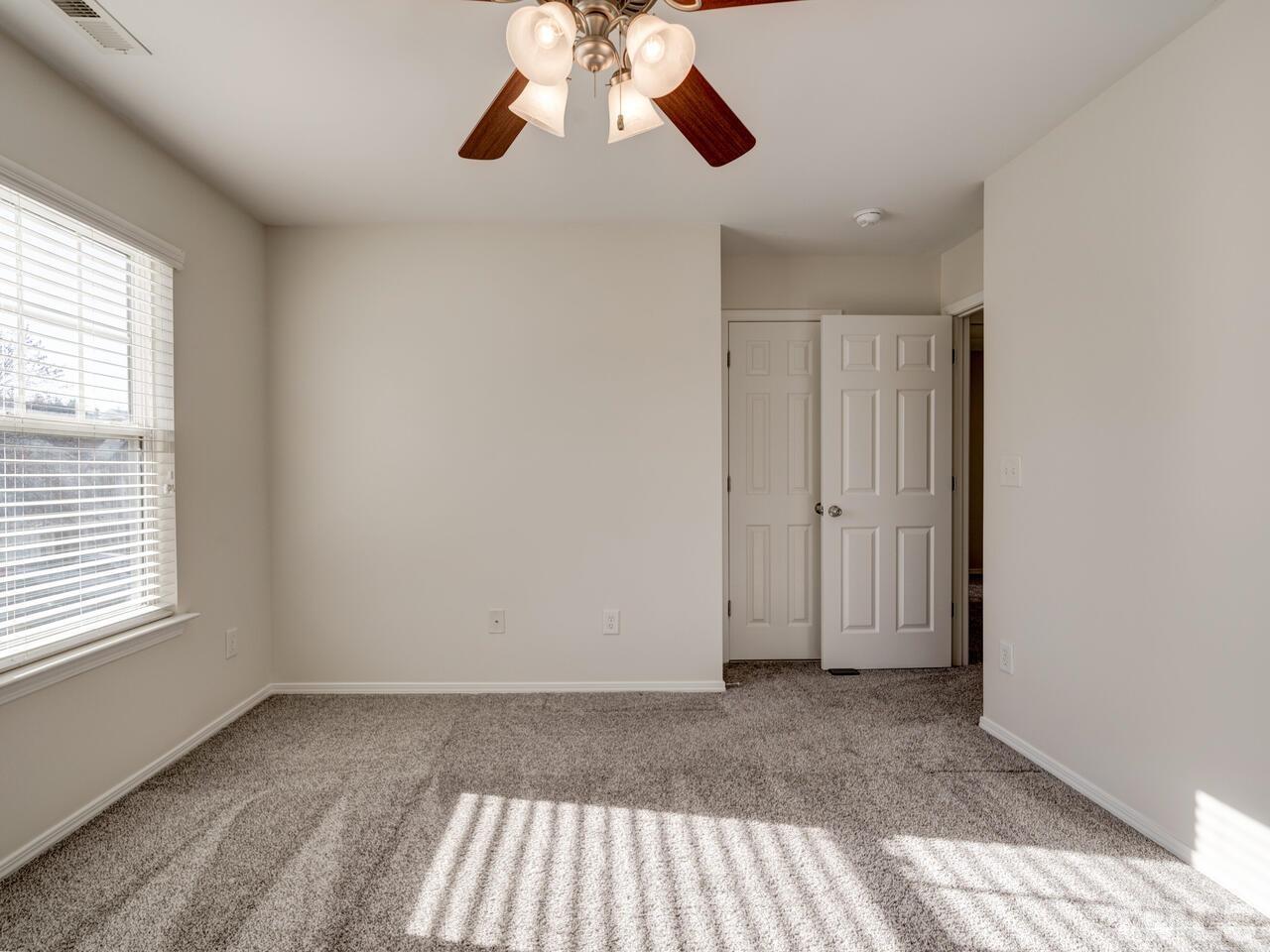 8219 Beaded Stone Street Raleigh, NC 27613 - Photo 28 of 45 a view of an empty room