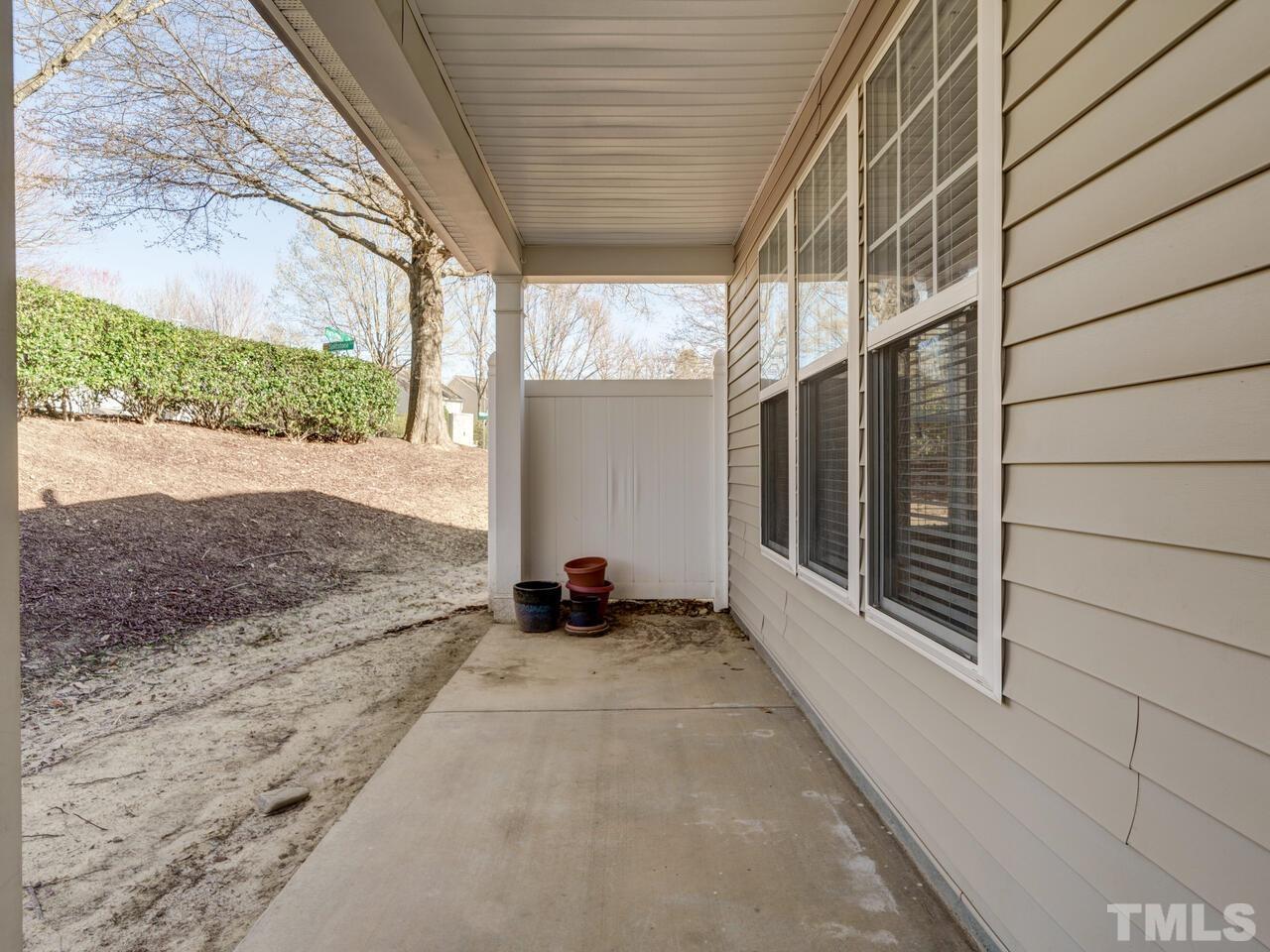 8219 Beaded Stone Street Raleigh, NC 27613 - Photo 43 of 45 a view of a backyard of a house