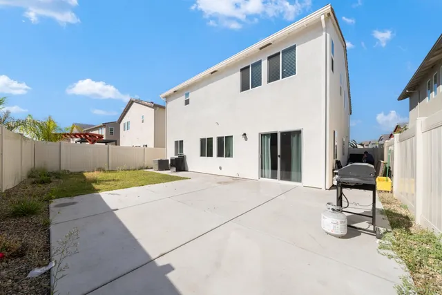 a view of a front of house with garage