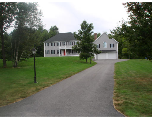 2 Old Farm Road Lunenburg, MA 01462 - Photo 1 of 19 a front view of a house with a yard and trees