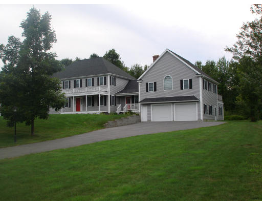 2 Old Farm Road Lunenburg, MA 01462 - Photo 19 of 19 a front view of a house with a yard and trees