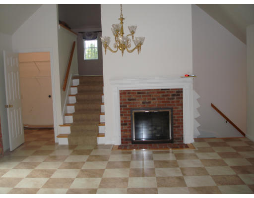2 Old Farm Road Lunenburg, MA 01462 - Photo 4 of 19 a living room with furniture and a fireplace
