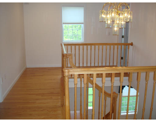 2 Old Farm Road Lunenburg, MA 01462 - Photo 5 of 19 a view of staircase with railing and chandelier