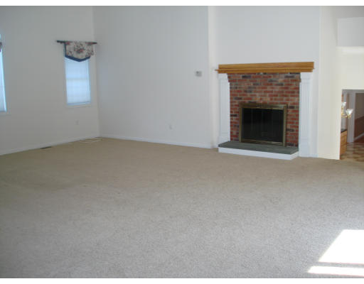 2 Old Farm Road Lunenburg, MA 01462 - Photo 6 of 19 a view of empty room with a fireplace