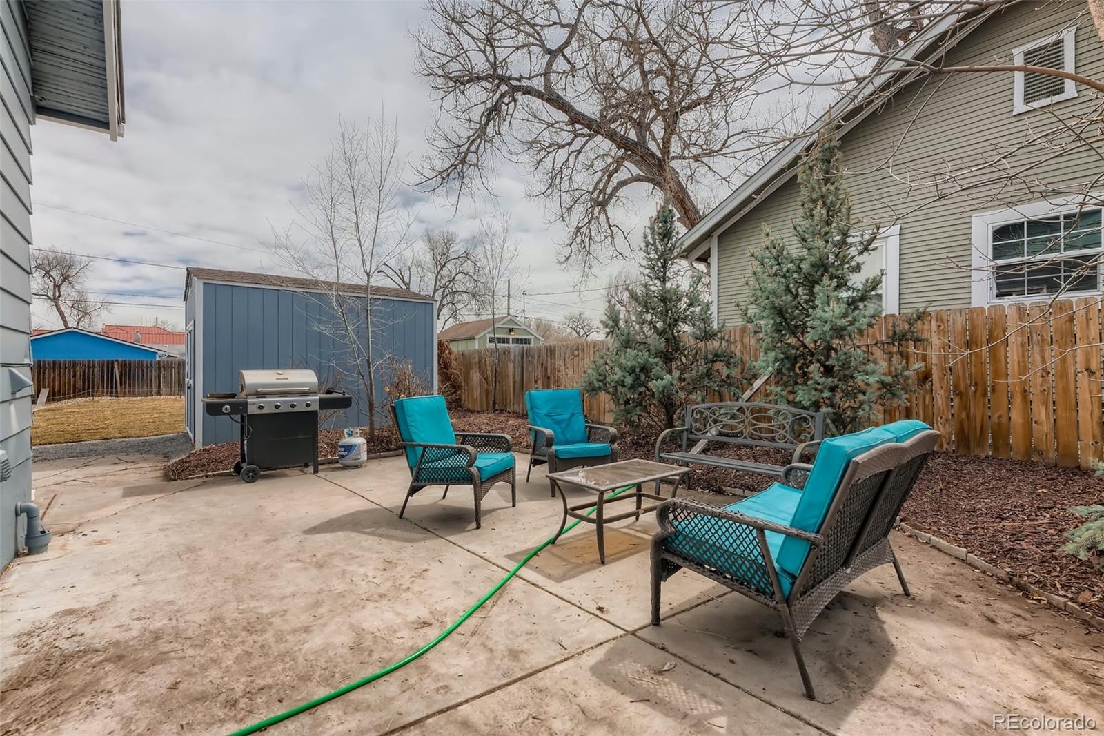 44 Julian Street Denver, CO 80219 - Photo 23 of 26 a view of a backyard with sitting area