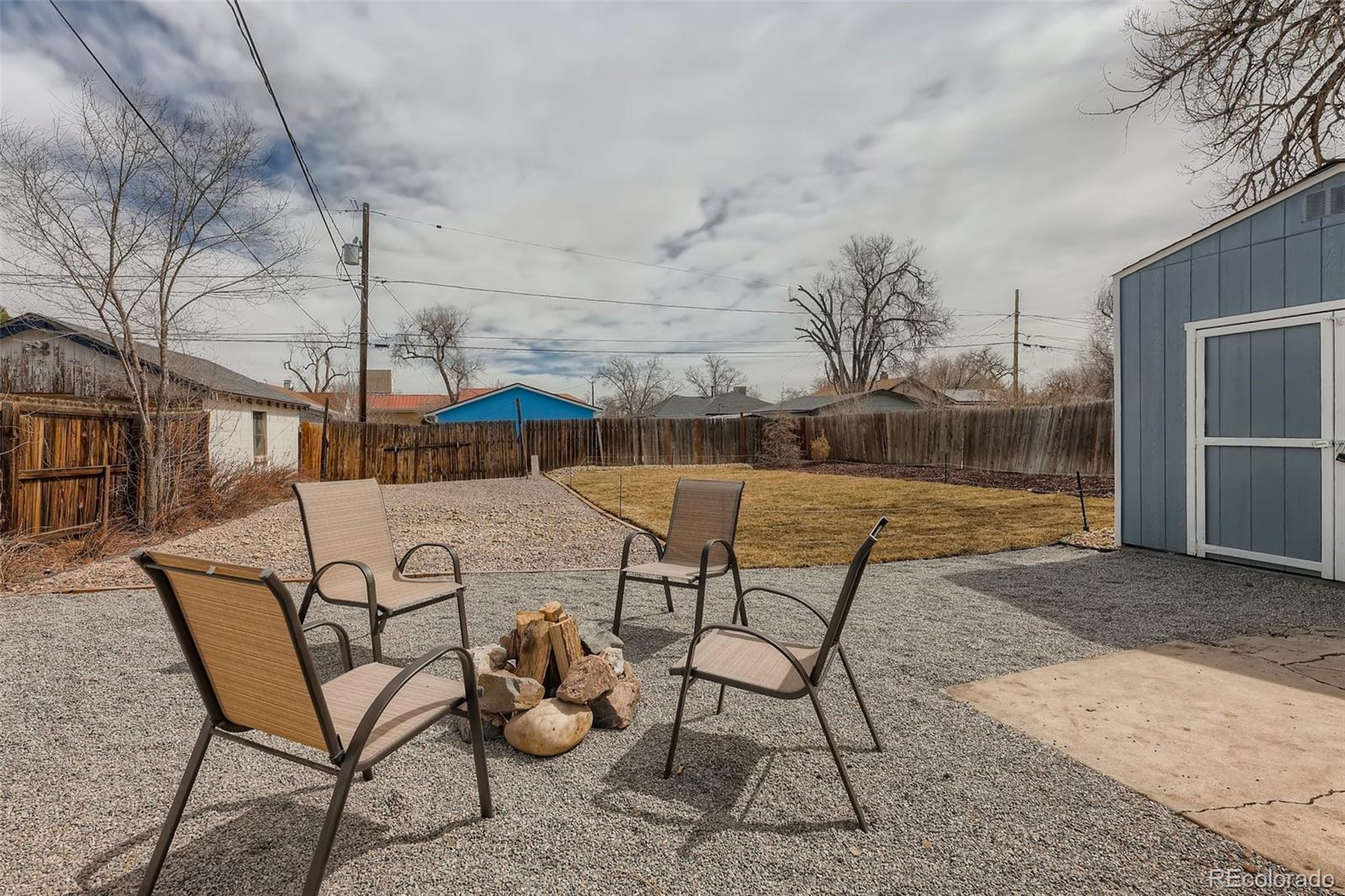 44 Julian Street Denver, CO 80219 - Photo 24 of 26 a view of a lake with table and chairs
