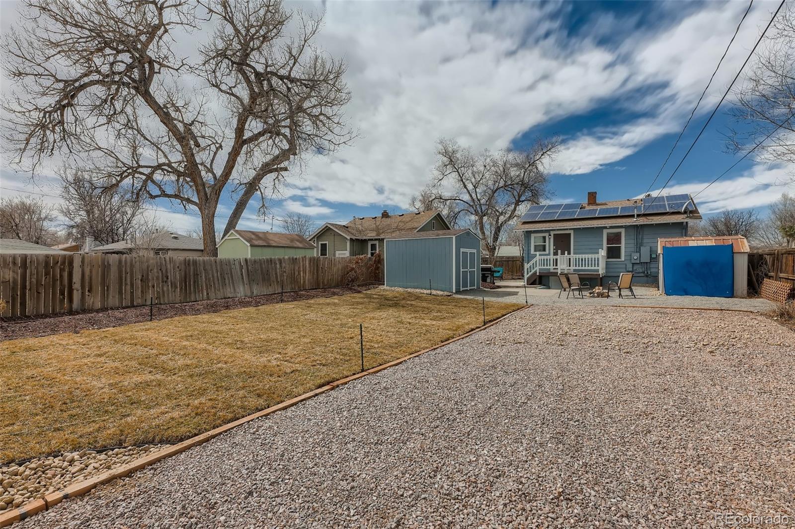 44 Julian Street Denver, CO 80219 - Photo 25 of 26 a front view of a house with a yard