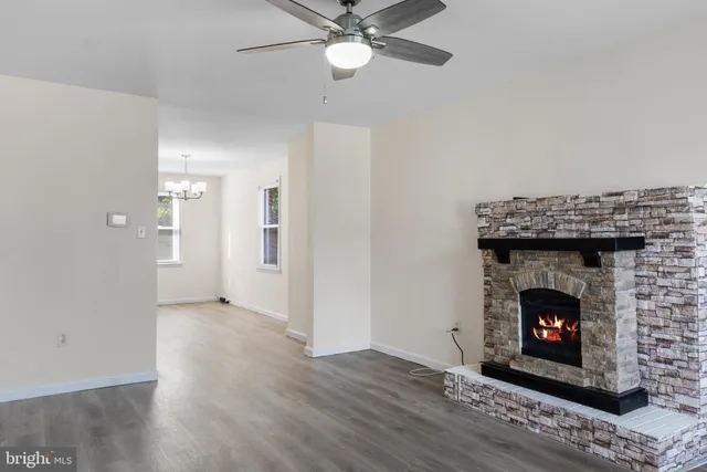 a living room with a fireplace