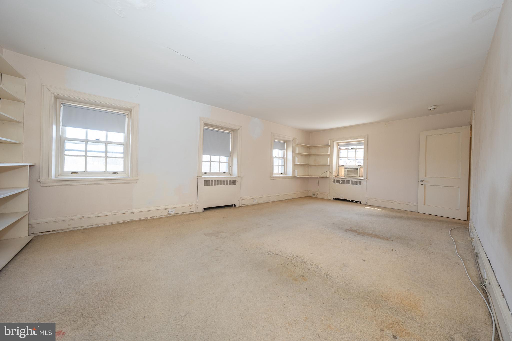 451 Merion Road Merion Station, PA 19066 - Photo 25 of 42 an empty room with windows