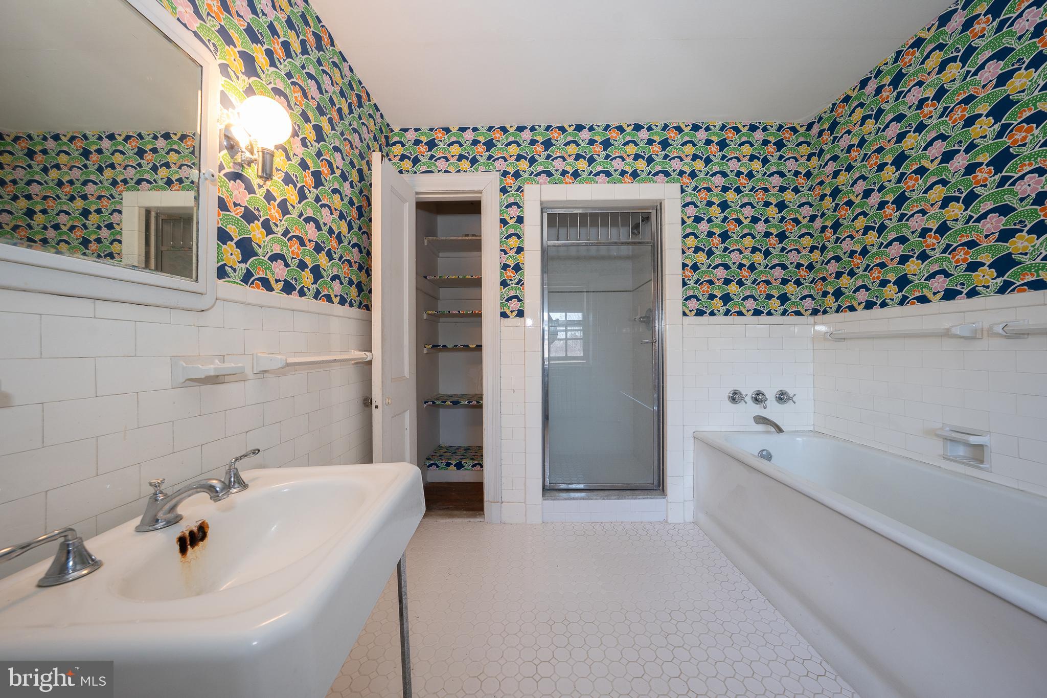 451 Merion Road Merion Station, PA 19066 - Photo 26 of 42 a bathroom with a bathtub and a shower
