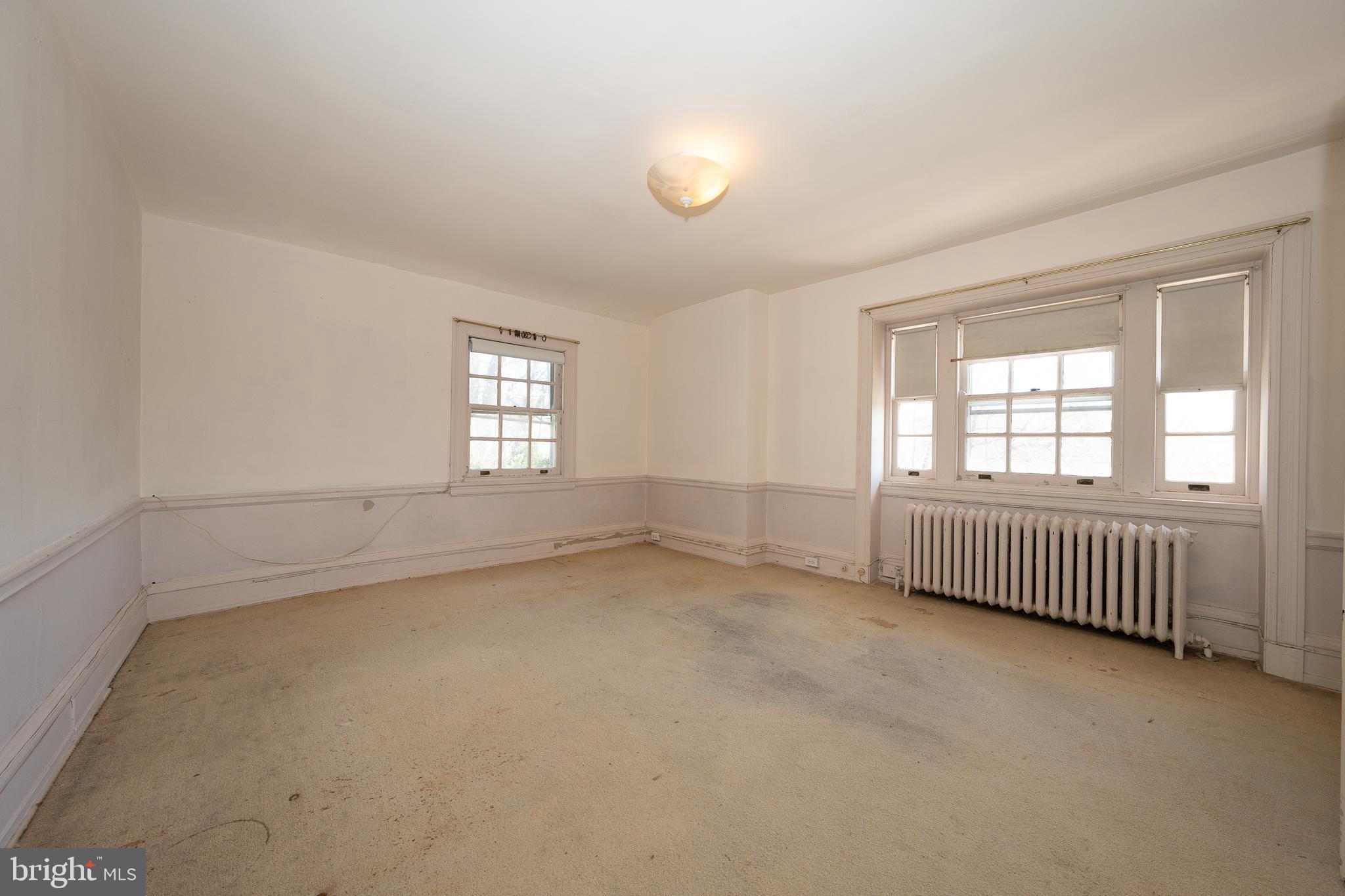 451 Merion Road Merion Station, PA 19066 - Photo 27 of 42 an empty room with windows