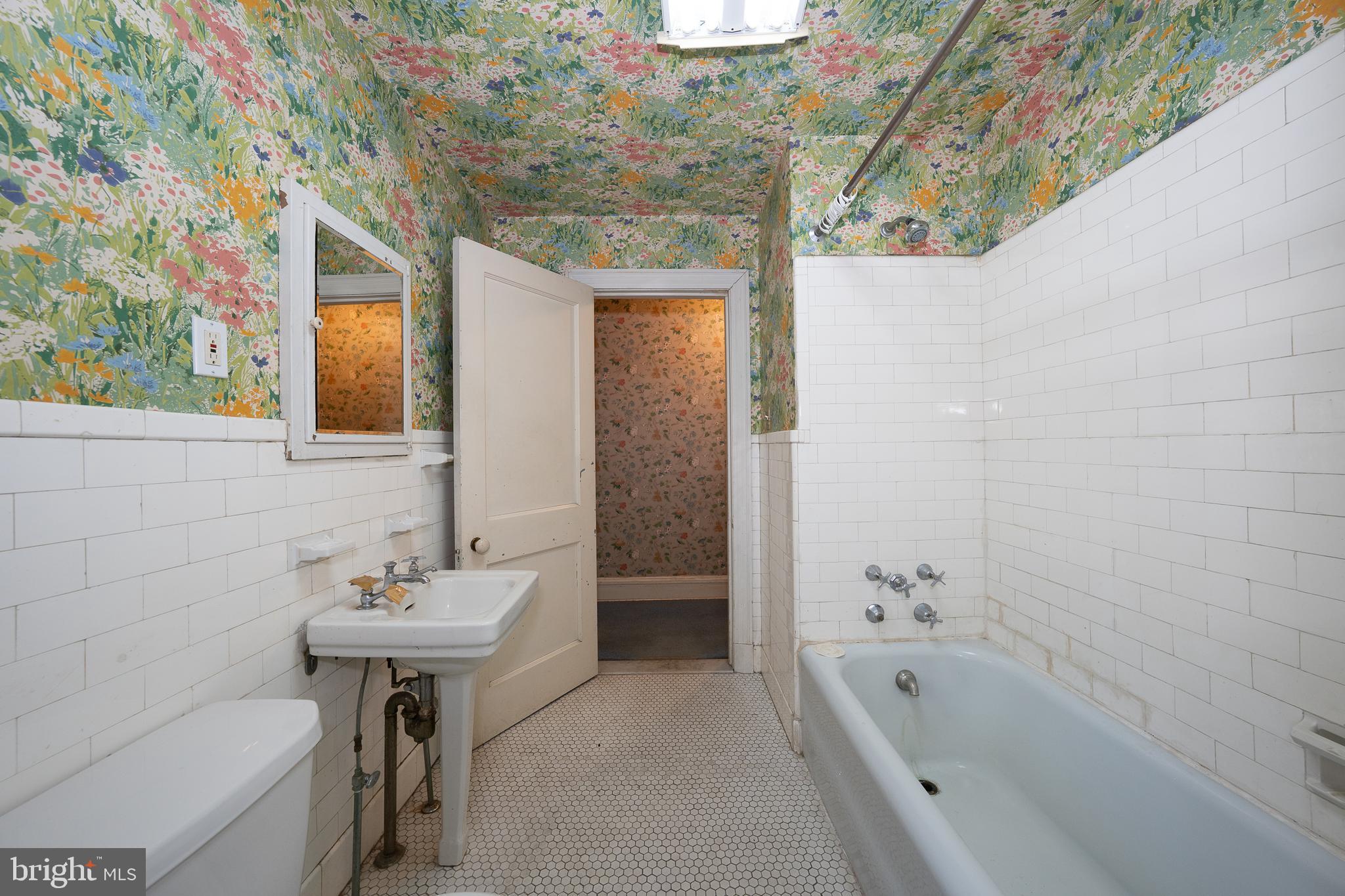 451 Merion Road Merion Station, PA 19066 - Photo 28 of 42 a bathroom with a sink a toilet and bathtub