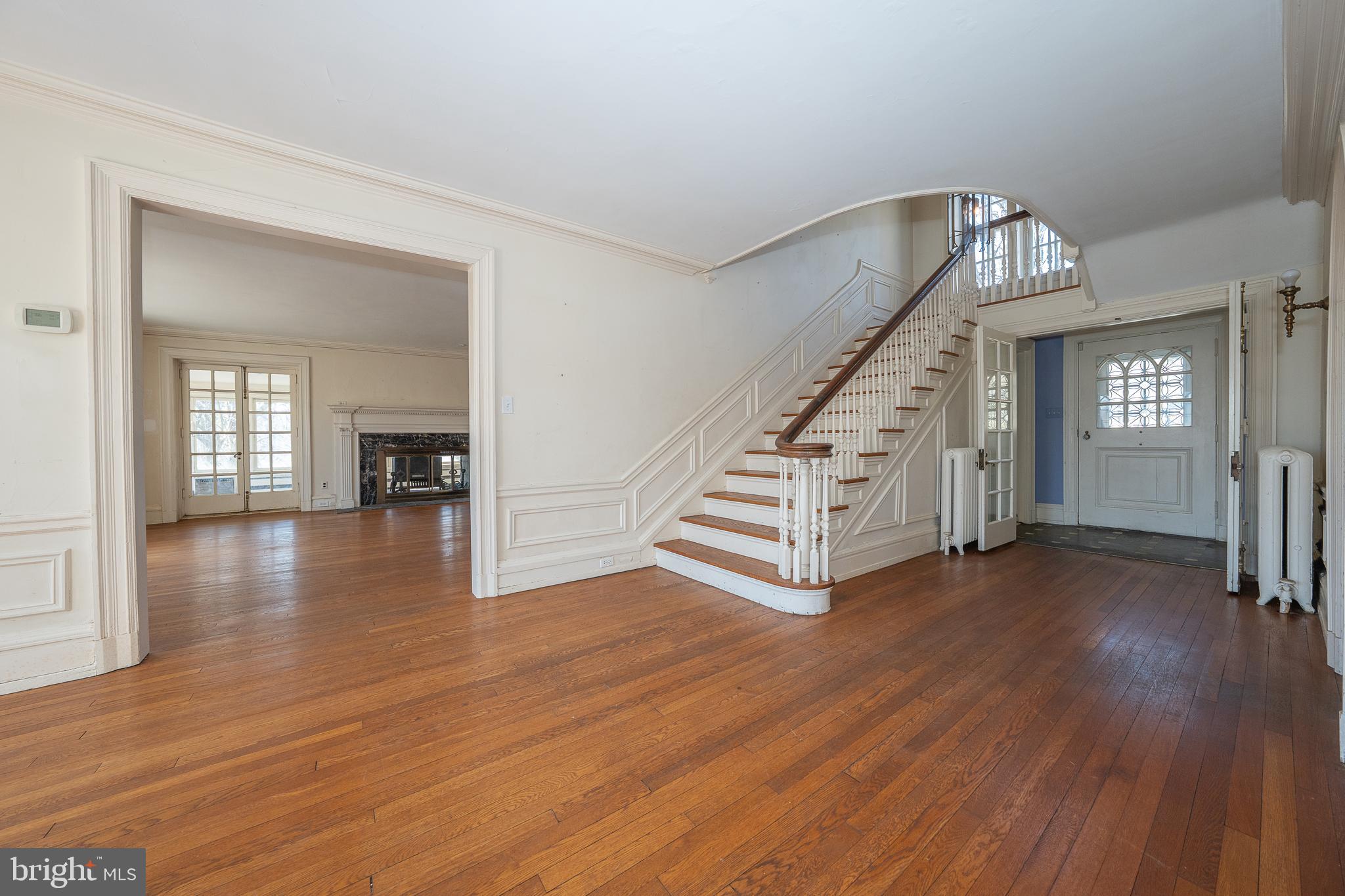 451 Merion Road Merion Station, PA 19066 - Photo 3 of 42 a view of an entryway with wooden floor and stairs
