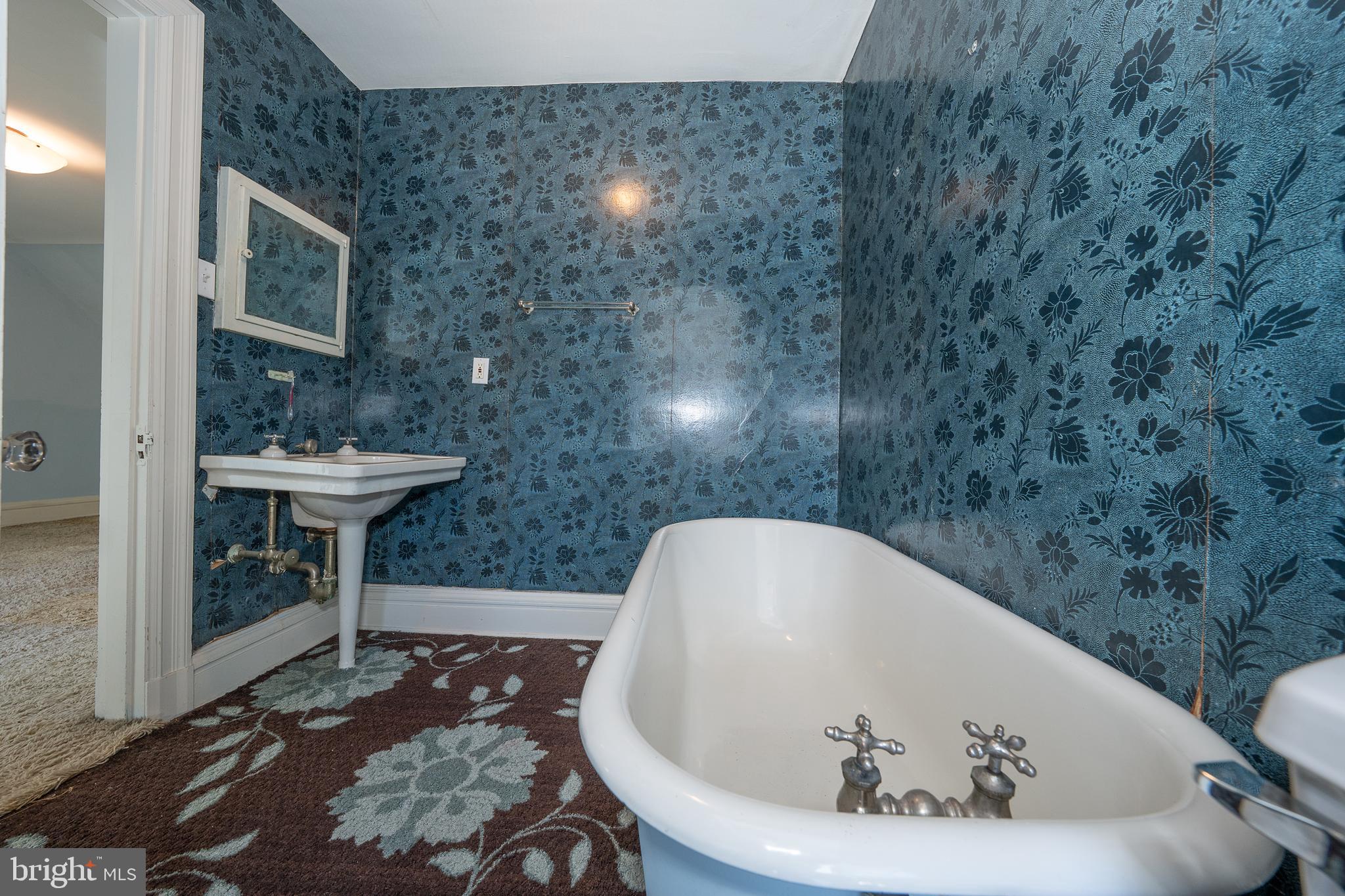 451 Merion Road Merion Station, PA 19066 - Photo 33 of 42 a white bath tub sitting in a bathroom