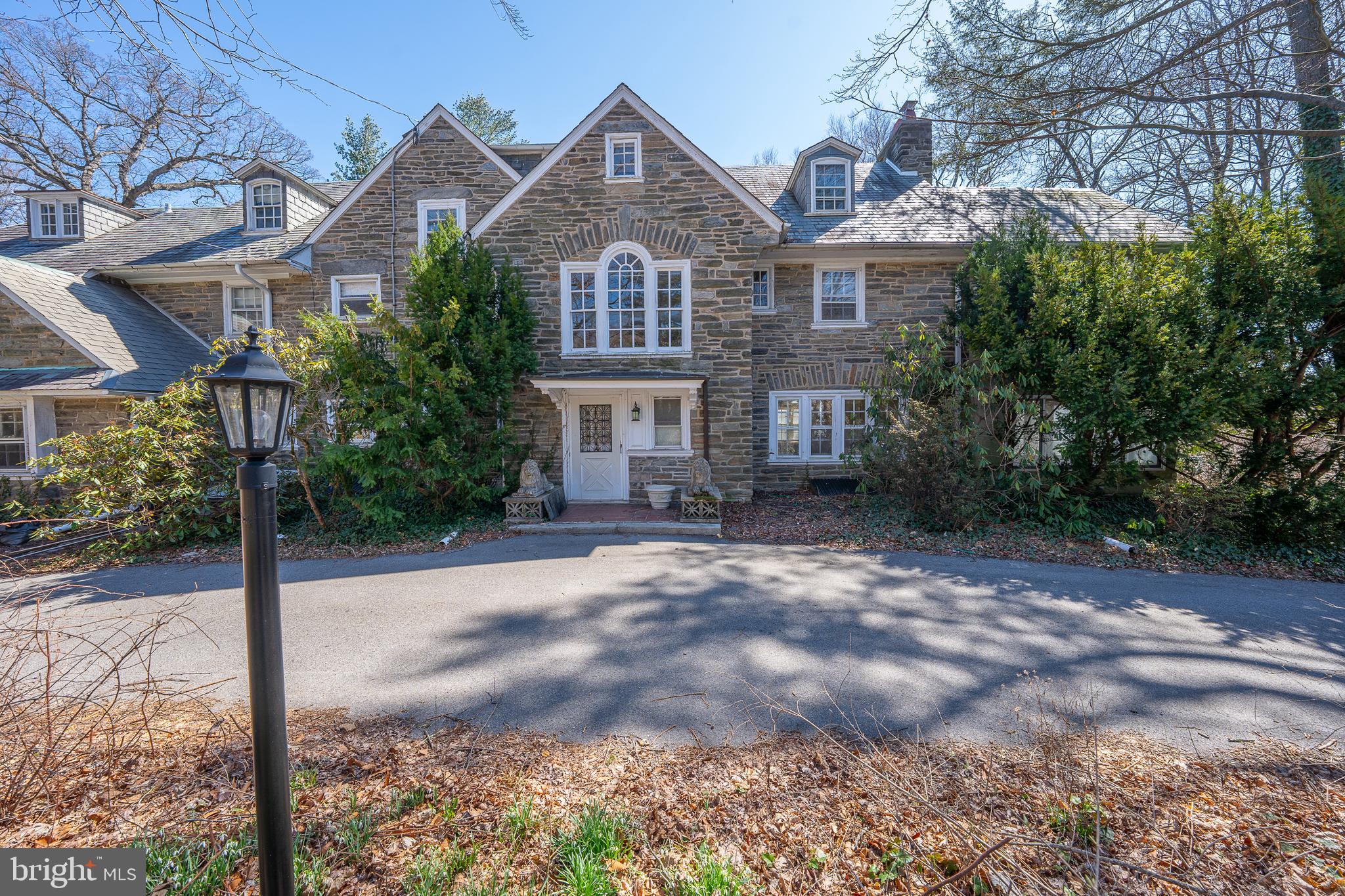 451 Merion Road Merion Station, PA 19066 - Photo 42 of 42 a view of a white house next to a yard