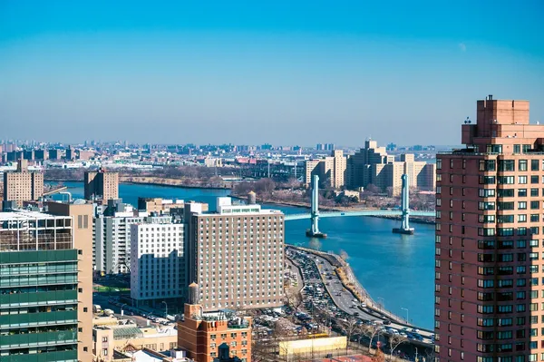 a view of a city with tall buildings