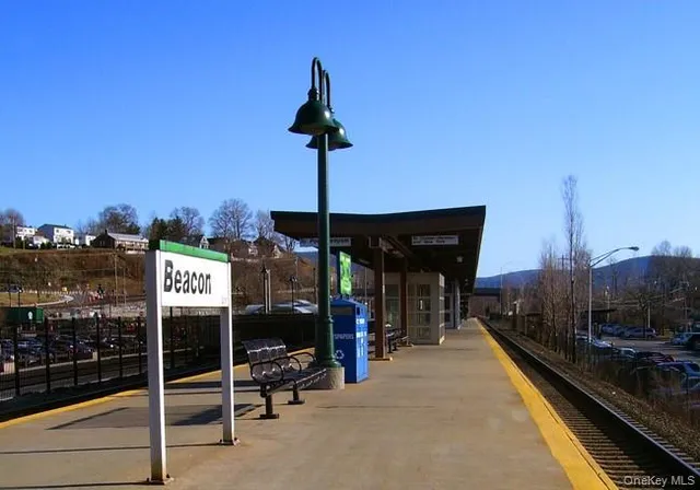 a view of a balcony with chairs