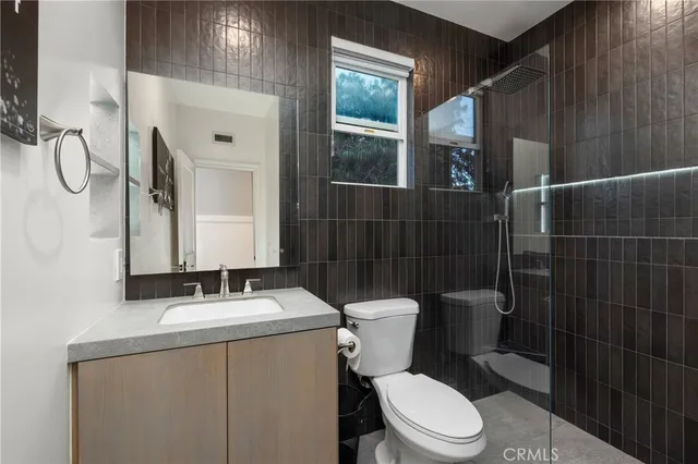 a large white bed in a white room