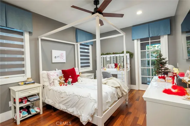 a bathroom with double sink and a mirror