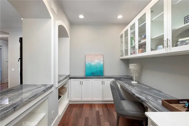 a view of swimming pool with seating area and furniture