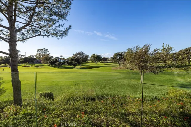 a view of a lake with a big yard