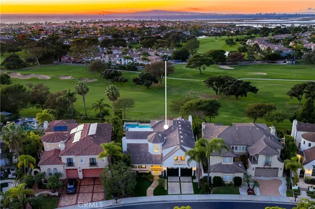 an aerial view of a houses with outdoor space and street view
