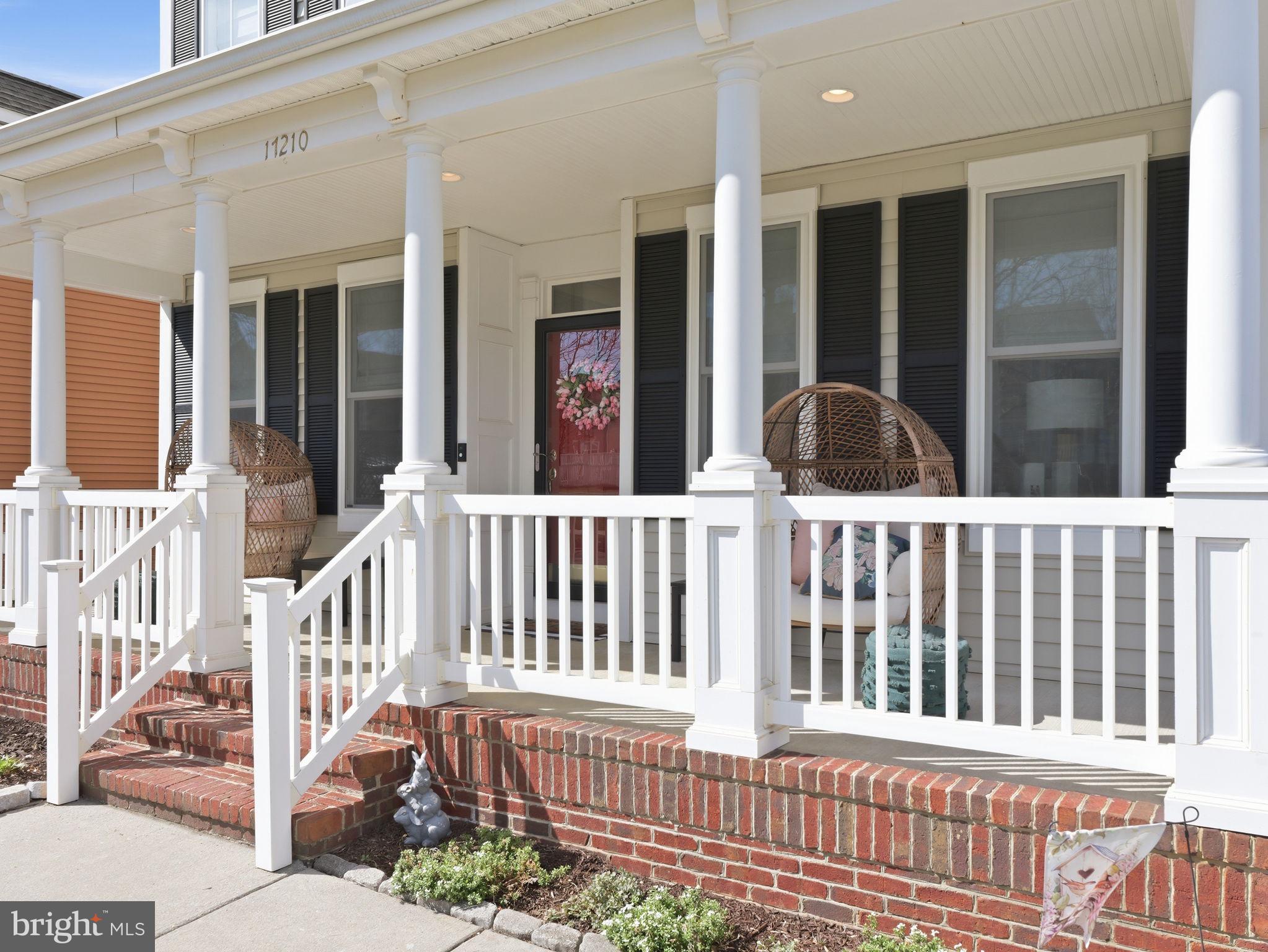 17210 Perinchief Street Ruther Glen, VA 22546 - Photo 2 of 39 a porch with a bench