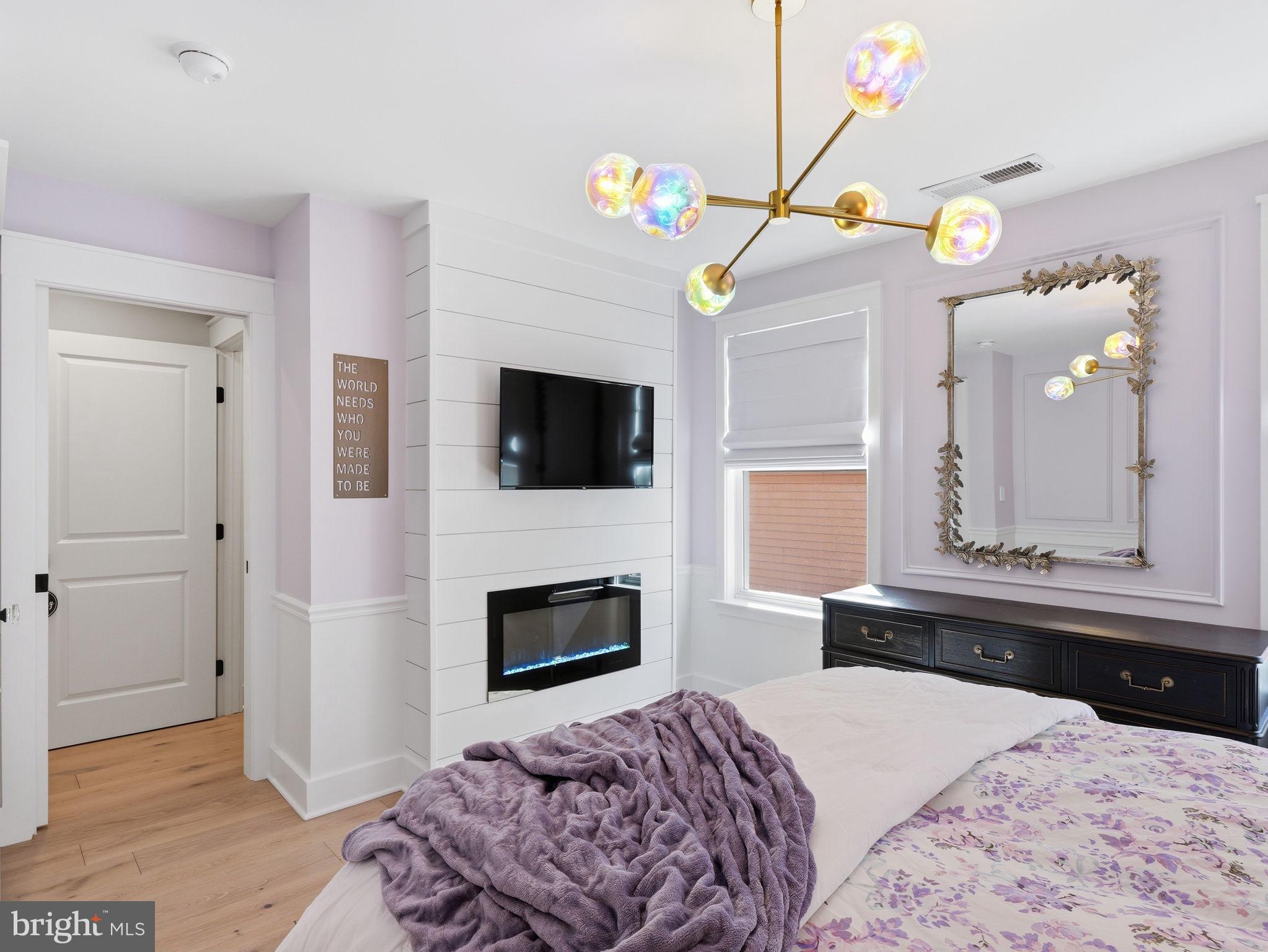 17210 Perinchief Street Ruther Glen, VA 22546 - Photo 24 of 39 a bedroom with a bed and a television