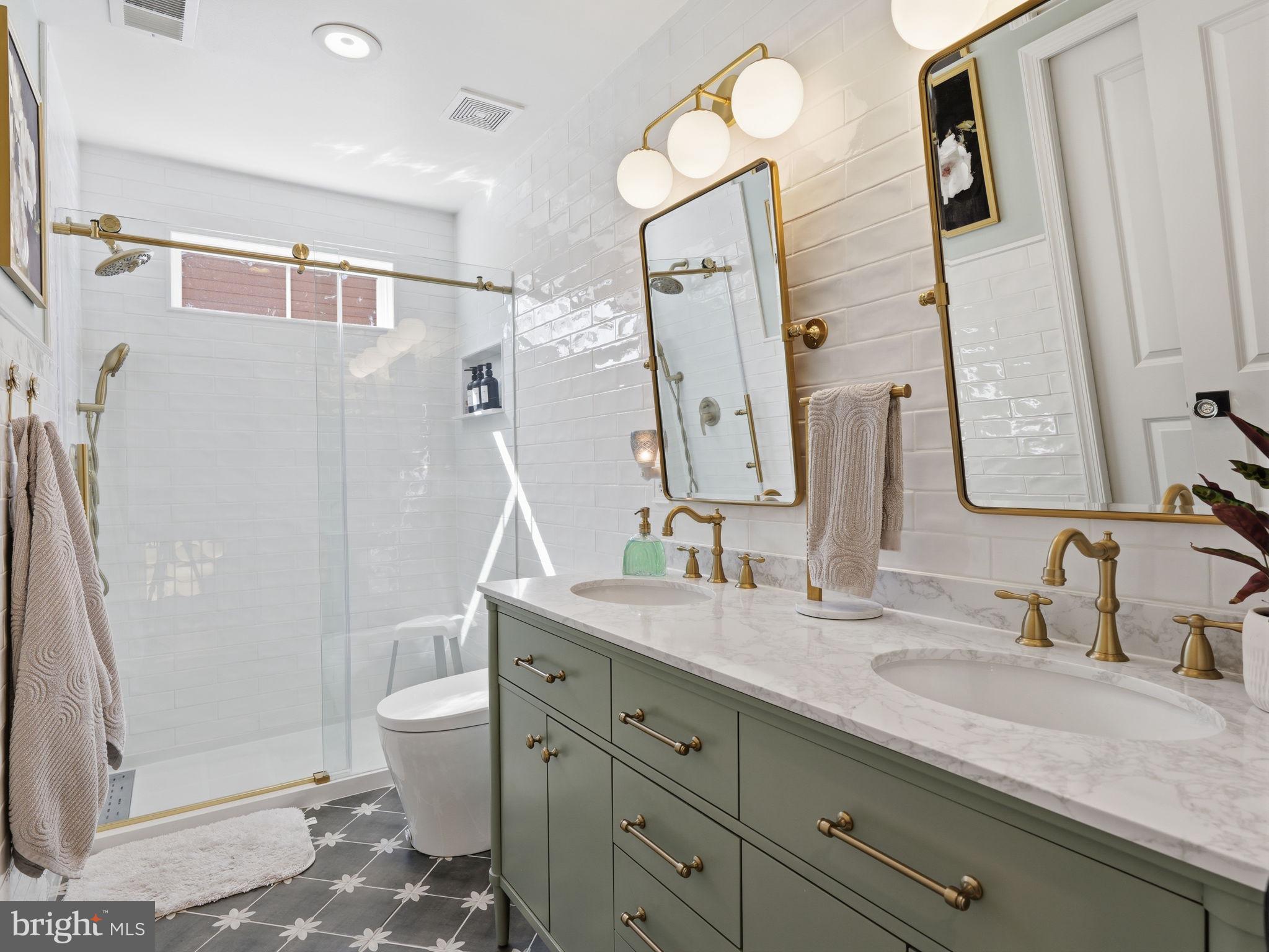 17210 Perinchief Street Ruther Glen, VA 22546 - Photo 25 of 39 a bathroom with a granite countertop sink toilet and shower