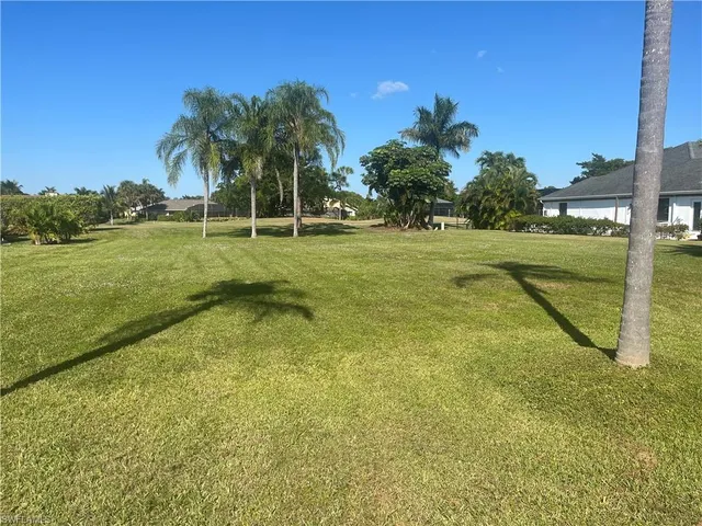 a view of a garden and basketball court