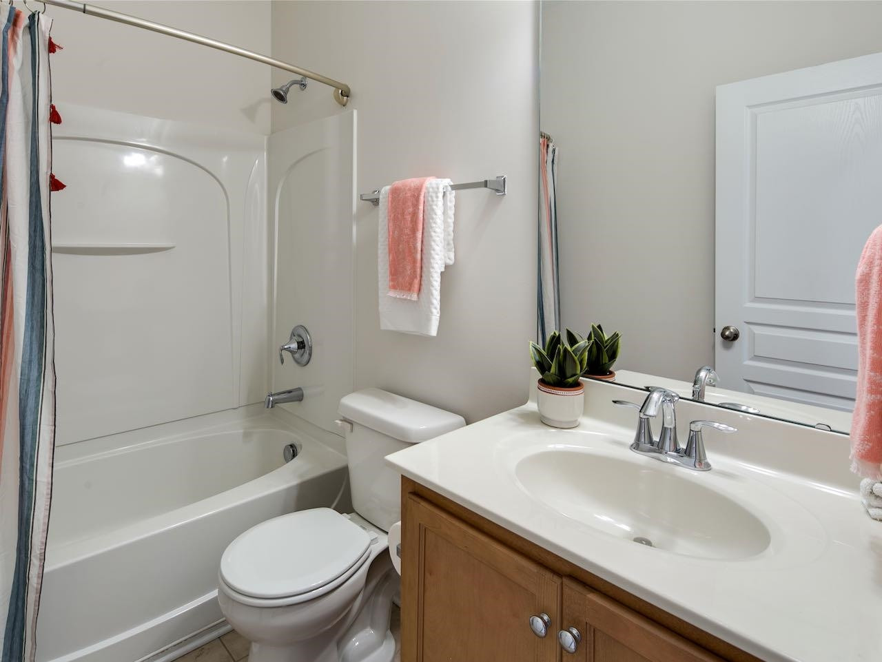 9133 Wooden Road Raleigh, NC 27617 - Photo 23 of 26 The shower curtain belongs to the stager so you will need to make a quick trip to Home Goods after the closing. Second full bathroom