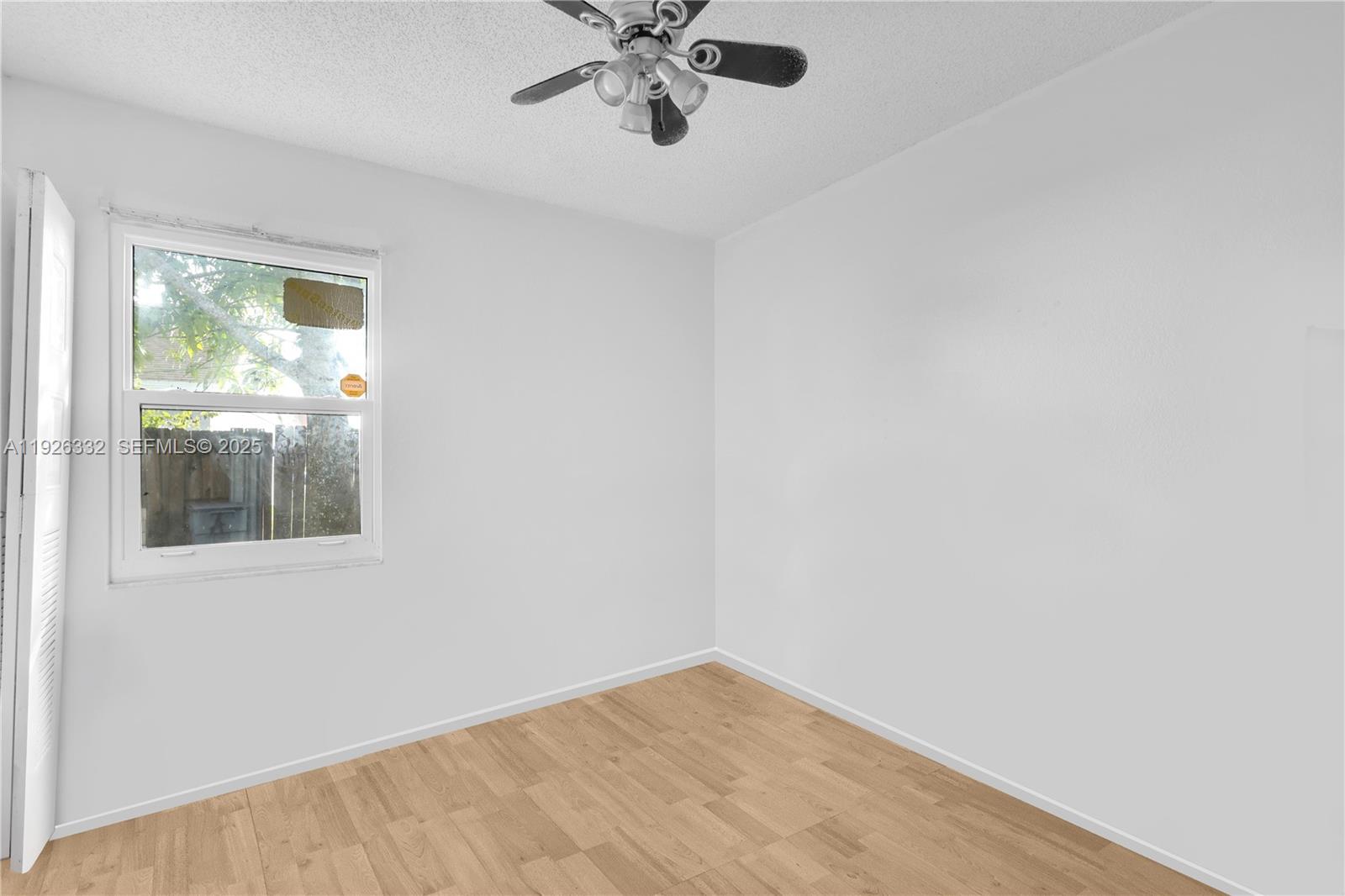 22882 Markham Way Boca Raton, FL 33428 - Photo 11 of 16 an empty room with window