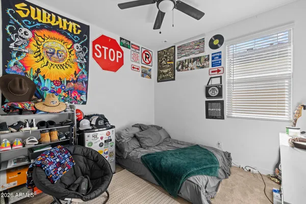 a bathroom with a double vanity sink toilet and a mirror