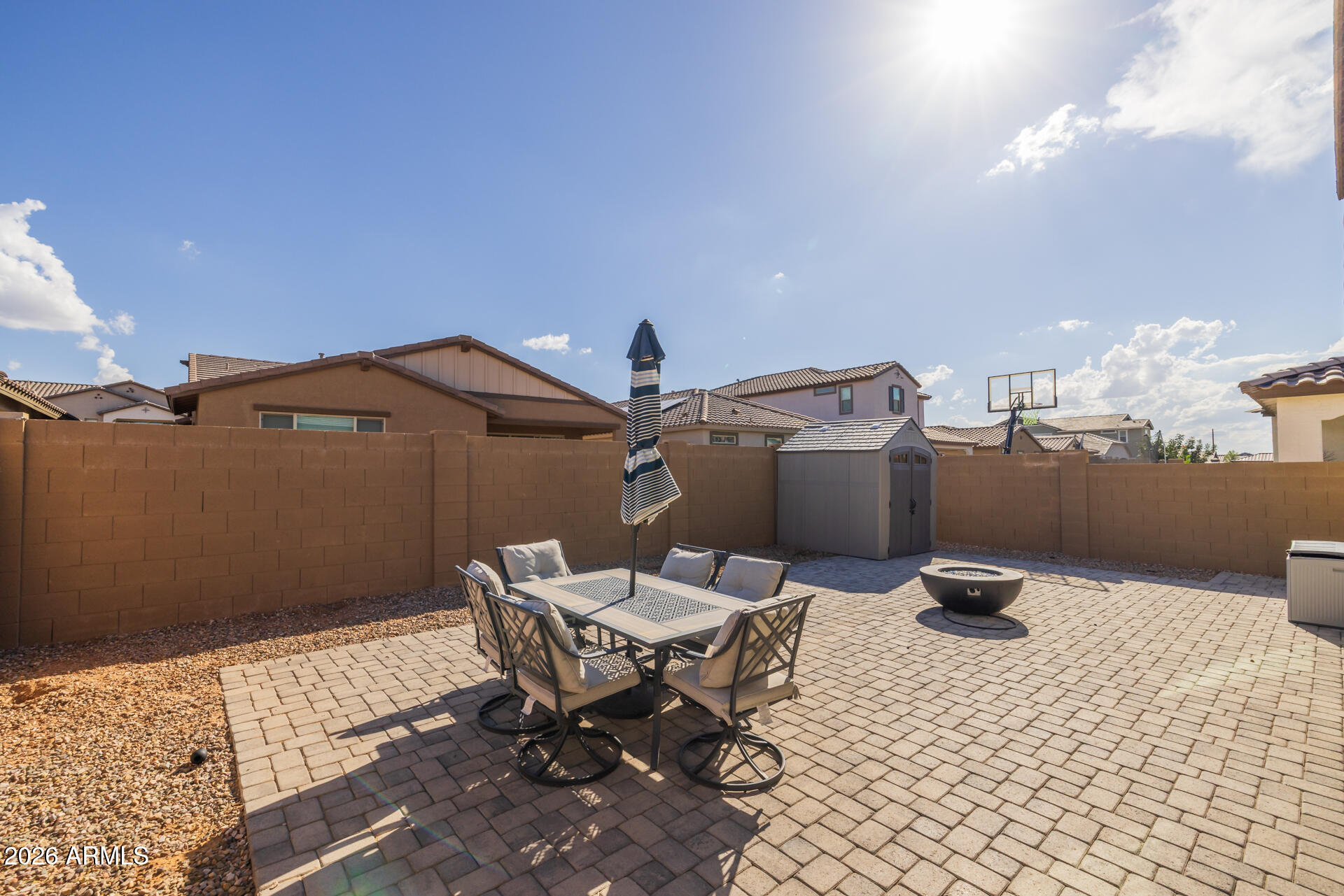 4143 East Appaloosa Road Gilbert, AZ 85296 - Photo 23 of 36 a roof deck with table and chairs