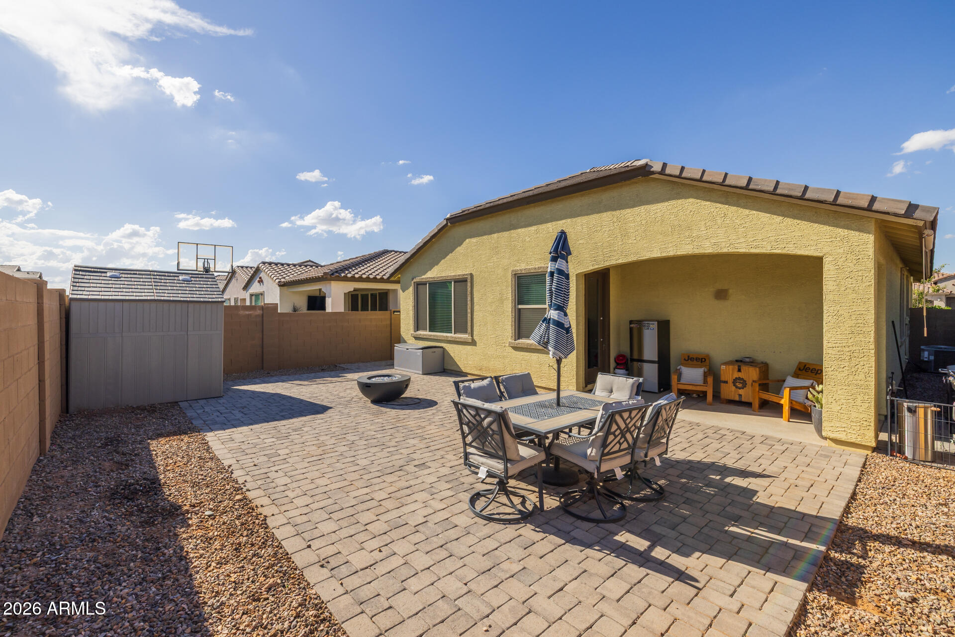 4143 East Appaloosa Road Gilbert, AZ 85296 - Photo 24 of 36 a view of a dinning table and chair in the patio