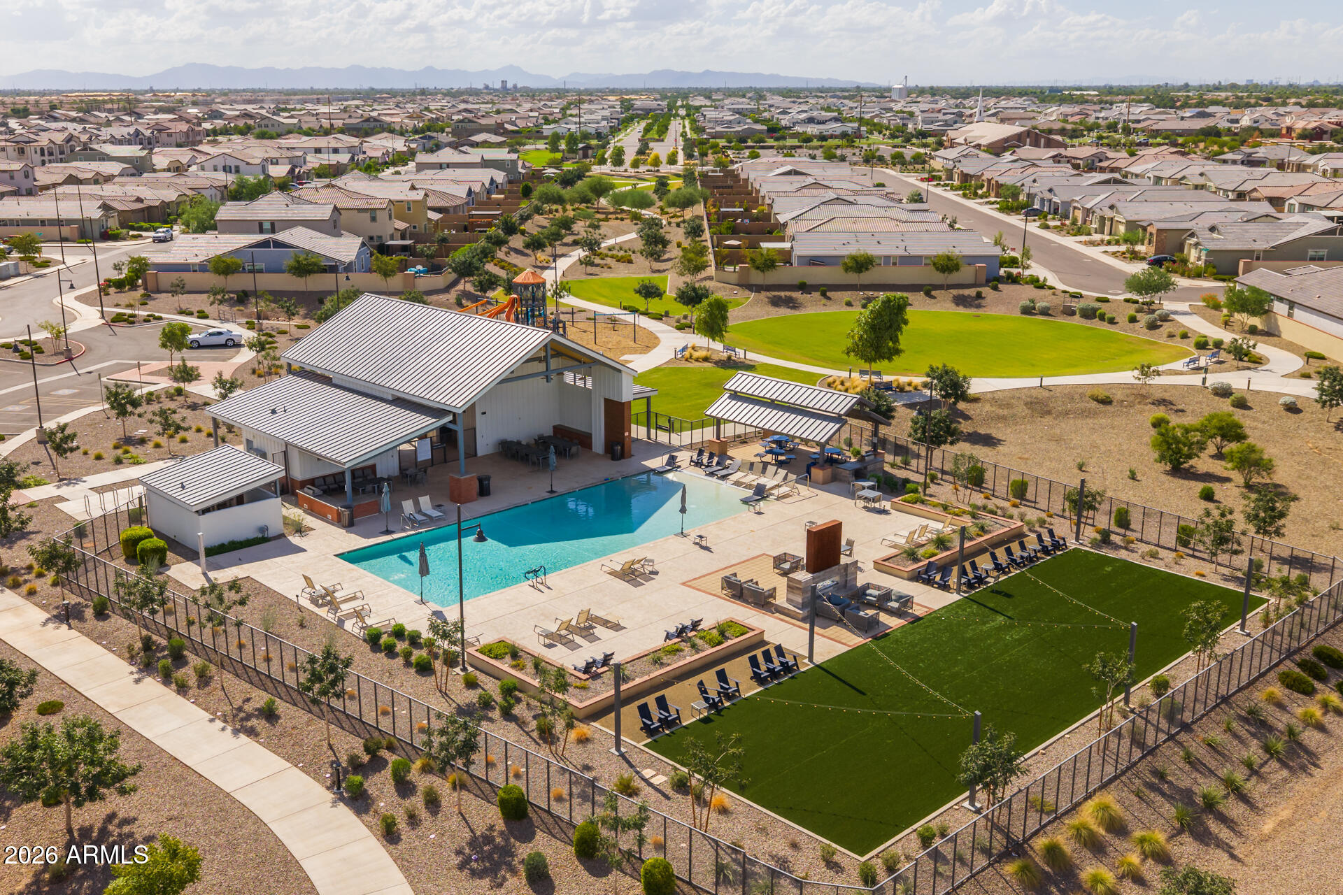 4143 East Appaloosa Road Gilbert, AZ 85296 - Photo 33 of 36 an aerial view of residential houses with outdoor space