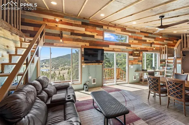 a living room with furniture and a window