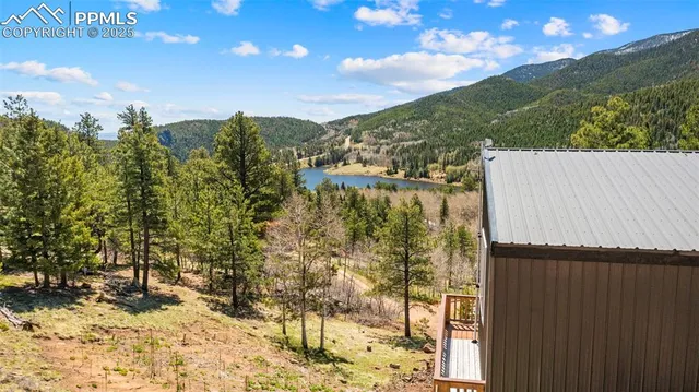 a view of house with roof deck