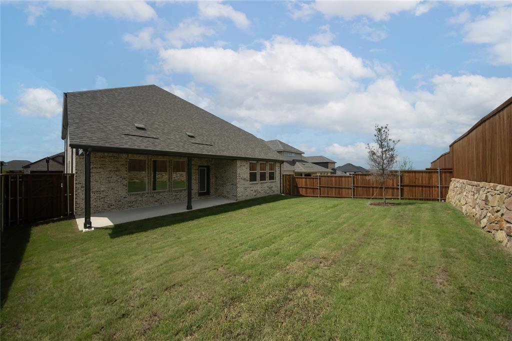 2405 St George Drive Celina, TX 75009 - Photo 1 of 30 a view of a backyard of the house