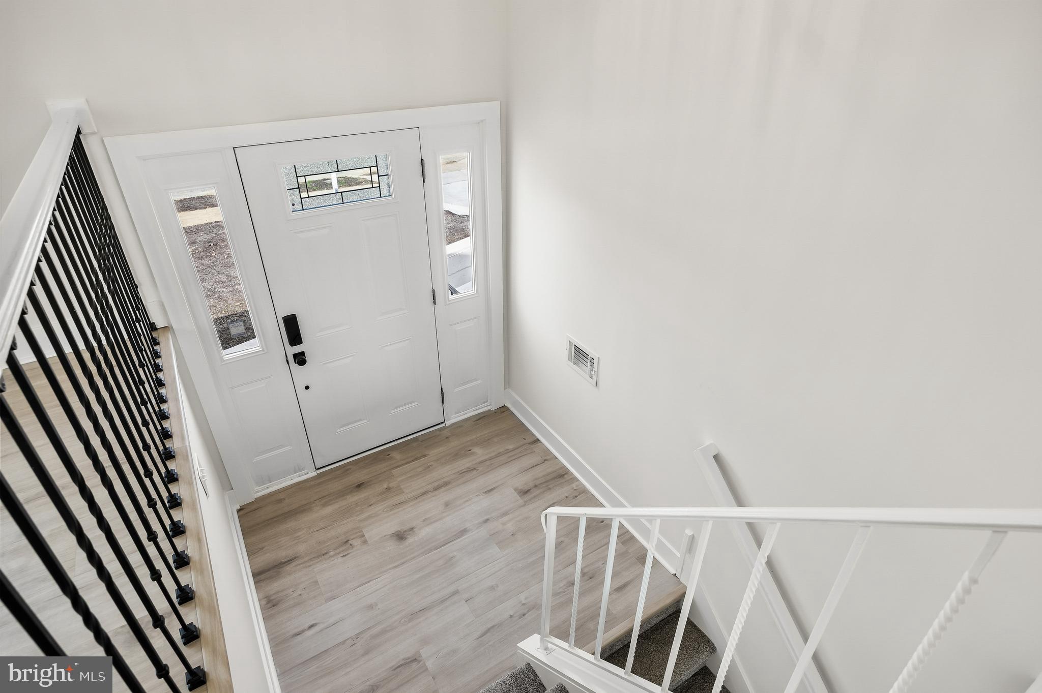 10 Cobblestone Road Cherry Hill, NJ 08003 - Photo 2 of 15 a view of an entryway with wooden floor