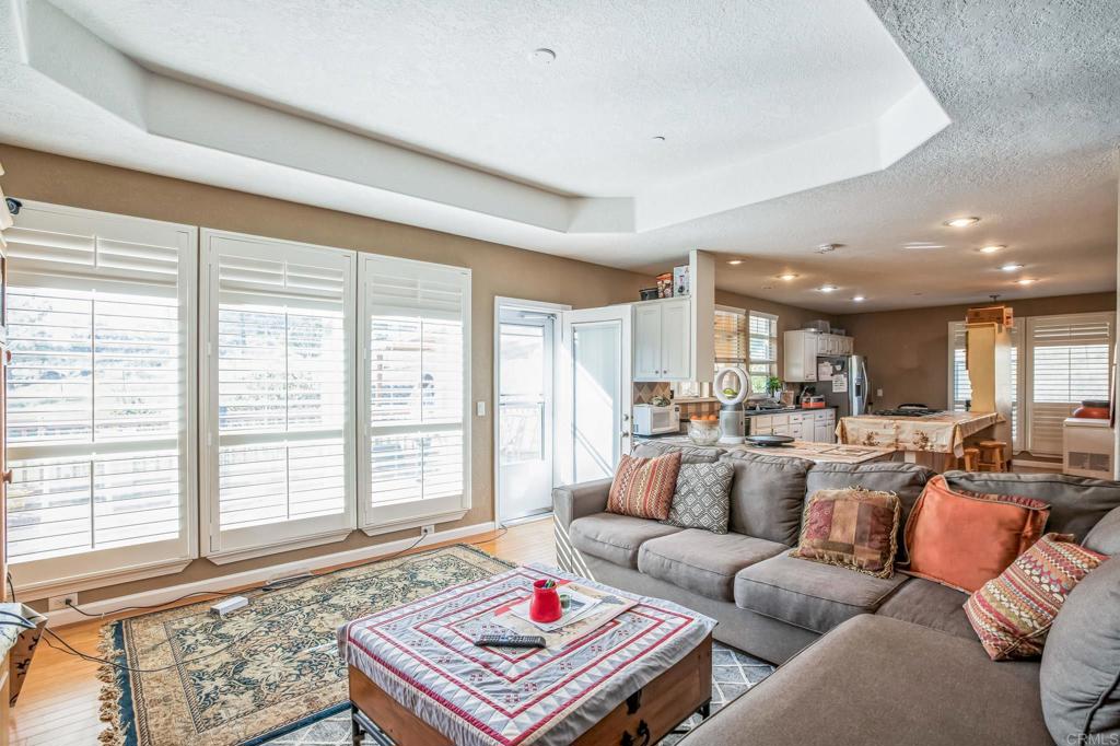 735 Swedes Flat Road Oroville, CA 95966 - Photo 11 of 37 a living room with furniture and a large window