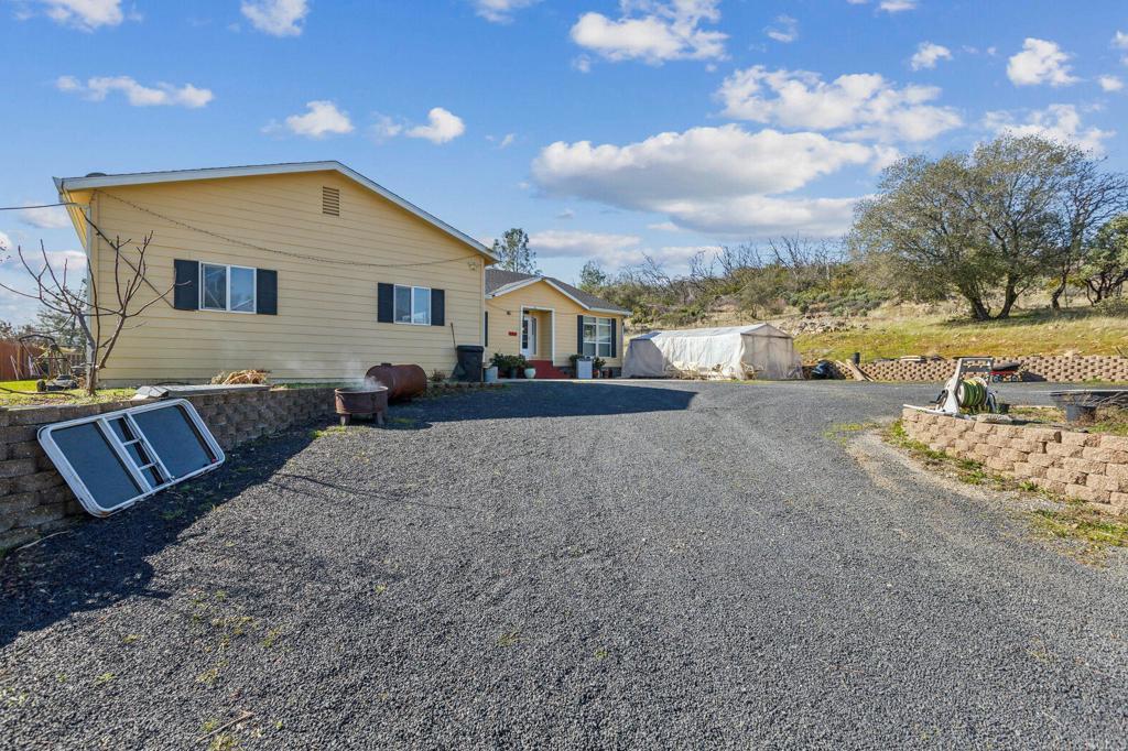 735 Swedes Flat Road Oroville, CA 95966 - Photo 26 of 37 a view of a house with a yard
